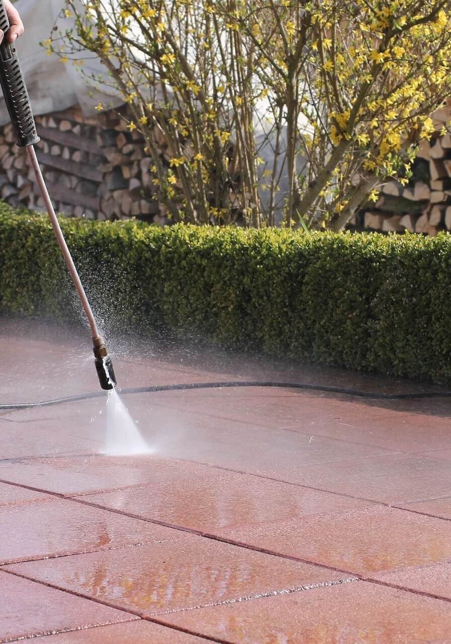 Pressure washing technician at work